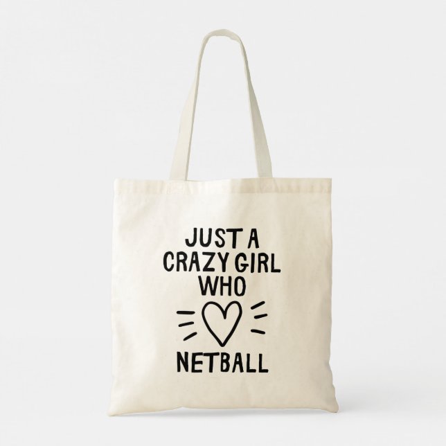 Just a crazy girl who loves netball. tote bag (Back)