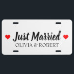 Just Married Personalized License Plate<br><div class="desc">Just married text with white background and two red hearts.</div>