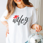 Just Married Wifey Modern Elegant simple Script T-Shirt<br><div class="desc">Celebrate the joy of being a 'Wifey' with this Valentine's Day tee. 
The simple and modern caligraphic font,  complemented by three adorable red hearts,  makes this shirt perfect for newlyweds or those in the honeymoon phase. 
Express your love with style and grace in this delightful and charming t-shirt.</div>