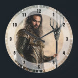Justice League | Aquaman On Battlefield Large Clock<br><div class="desc">Check out Justice League's Aquaman standing on a mist filled, rocky terrain. Aquaman holds his trident at the ready, fist clenched, while the sun dawns behind him causing the mist and clouds to glow bright.</div>