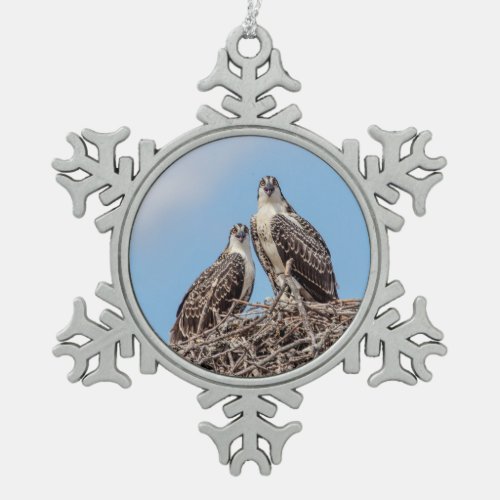 Juvenile Osprey in the nest Snowflake Pewter Christmas Ornament