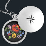 Kalocsa Embroidery - Hungarian Folk Art locket<br><div class="desc">Authentic embroidery design from Hungary on silver locket necklace. The art of Kalocsa Embroidery was born in the second half of the 19th century. Originally the needlework was only white and the embroidery patterns were merely made up by holes. At the end of the 19th century, the art of Kalocsa...</div>