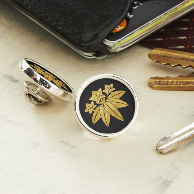 Kamakura Minamoto Mon Japanese faux gold on black Lapel Pin (In Situ)