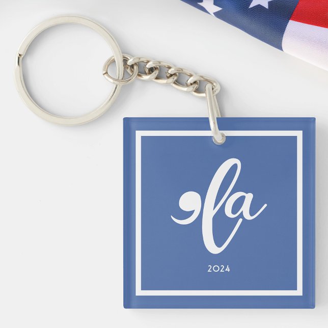 Kamala 2024 Say Her Name Acrylic Keychain (Kamala 2024 Say Her Name Acrylic Keychain Next to an American Flag)