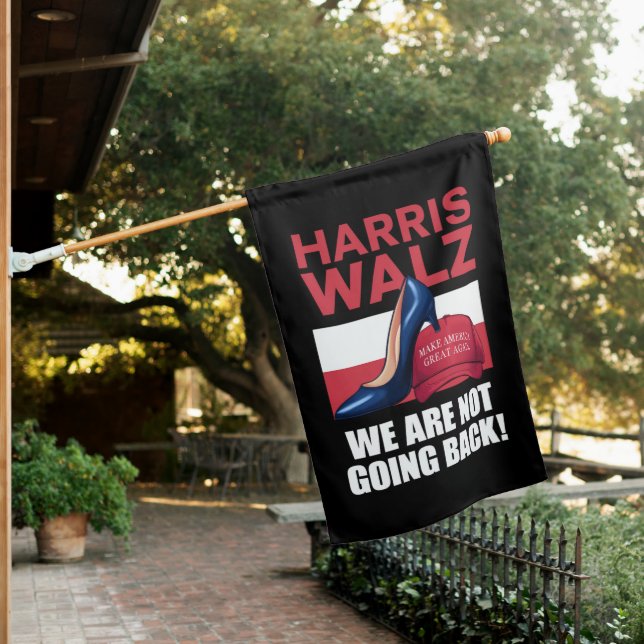 Kamala Harris Heels Stepping On Red MAGA Hat   House Flag (In SItu)