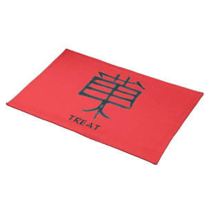 Kanji Treat black on red woven cotton placemat