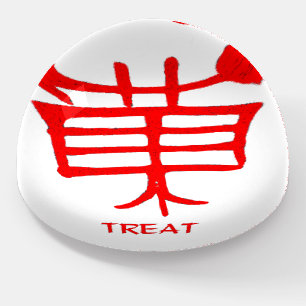 Kanji Treat red glass dome paperweight