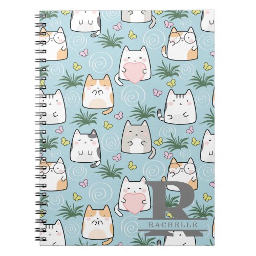 Kawaii Cat in a Sky Blue Background Notebook