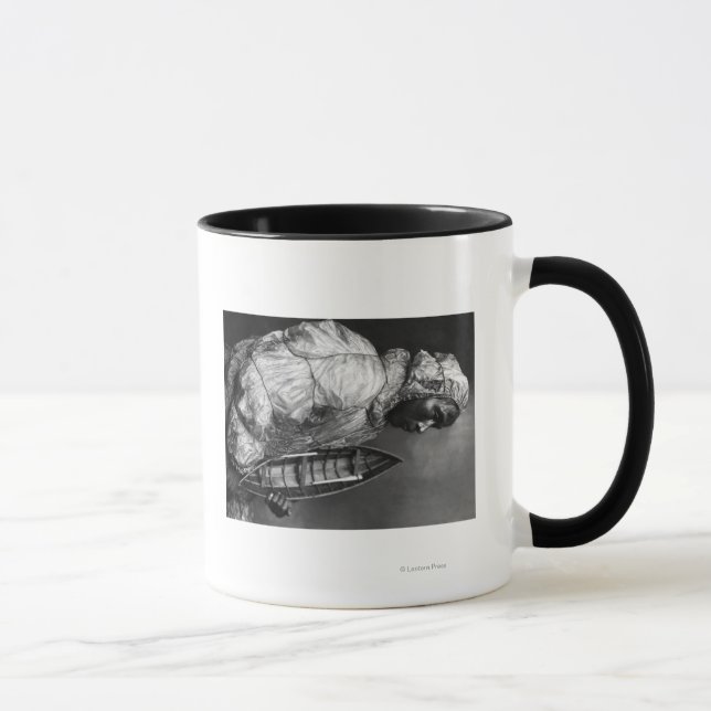 Kayaker wearing water-proof jacket with toy boat mug (Right)