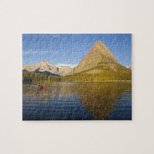 Kayaking in Swiftcurrent Lake at sunrise in the Jigsaw Puzzle