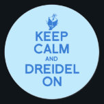 KEEP CALM AND DREIDEL ON CLASSIC ROUND STICKER<br><div class="desc">Happy Holigays! Shop Holiday Humor, LGBTQ Designs and Funny Christmas Gifts From LGBTShirts.com Shop for Everyone and Browse over 10, 000 LGBTQ Gifts, Holiday Humor, Equality, Slang, & Culture Designs. The Most Unique Gay, Lesbian Bi, Trans, Queer, and Intersexed Apparel on the web. SHOP MORE LGBTQ Designs and Gifts at:...</div>