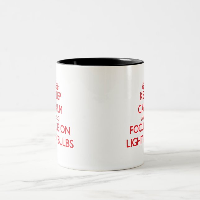 Keep Calm and focus on Light Bulbs Two-Tone Coffee Mug (Center)