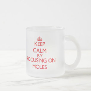 Keep calm by focusing on Moles Frosted Glass Coffee Mug