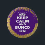 Keep Calm Purple Gold Bunco Button<br><div class="desc">Keep Calm and Bunco On graphic fun design.  Great gift or prizes for your next Bunco event.  Featured is a crown and three dice. Purple background color and white typography text. Faux gold modern border. Keep on rolling!</div>