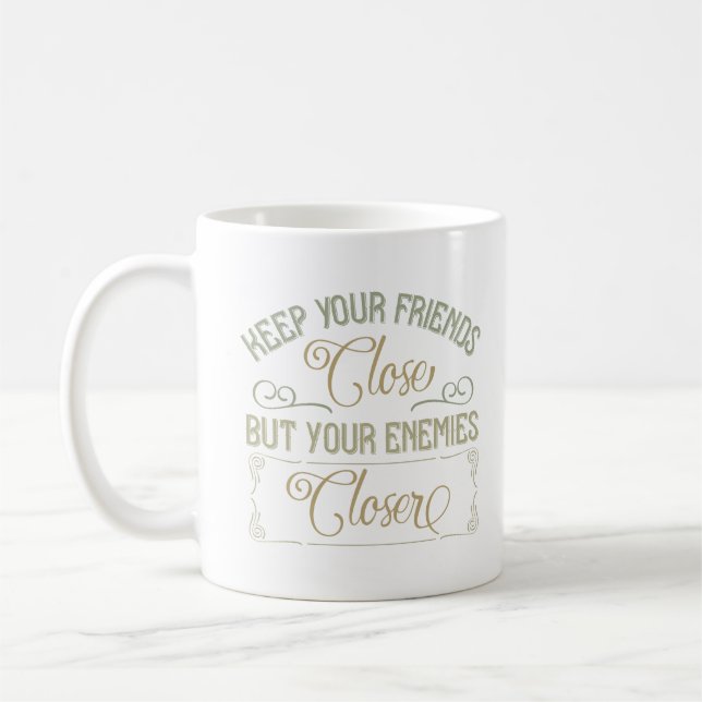 keep your friends close but your enemies closer coffee mug (Left)
