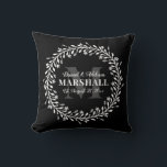Keepsake Newlywed Couple Wreath Monogram Name Throw Pillow<br><div class="desc">Floral Wreath Calligraphy Typography Monogram Throw Pillow in Black and White - Stylish black and white monogrammed throw pillow gift for a newly wed couple that features a custom monogram, groom & bride names, last name, and wedding date templates surrounded by a bold floral line art wreath. A thoughtful keepsake...</div>