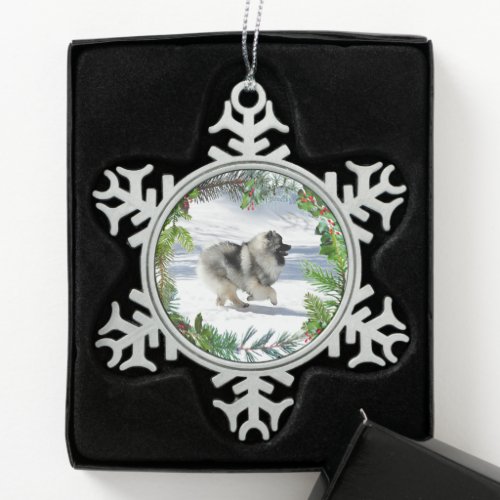 Kees running in snow Christmas ornament
