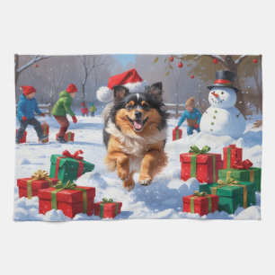 Keeshond Dog Running in Snow with Christmas Hat Kitchen Towel