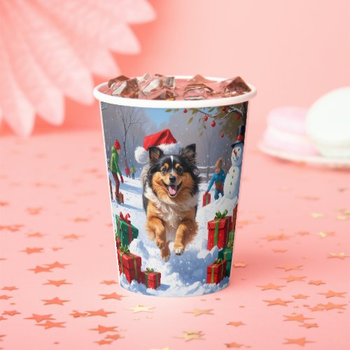 Keeshond Dog Running in Snow with Christmas Hat Paper Cups
