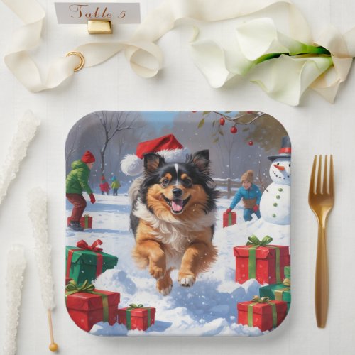 Keeshond Dog Running in Snow with Christmas Hat Paper Plates