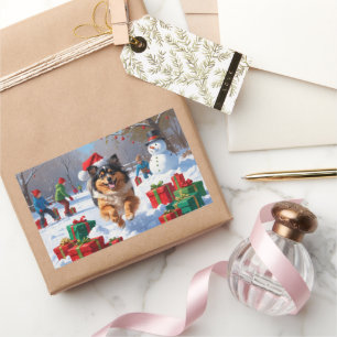 Keeshond Dog Running in Snow with Christmas Hat Rectangular Sticker