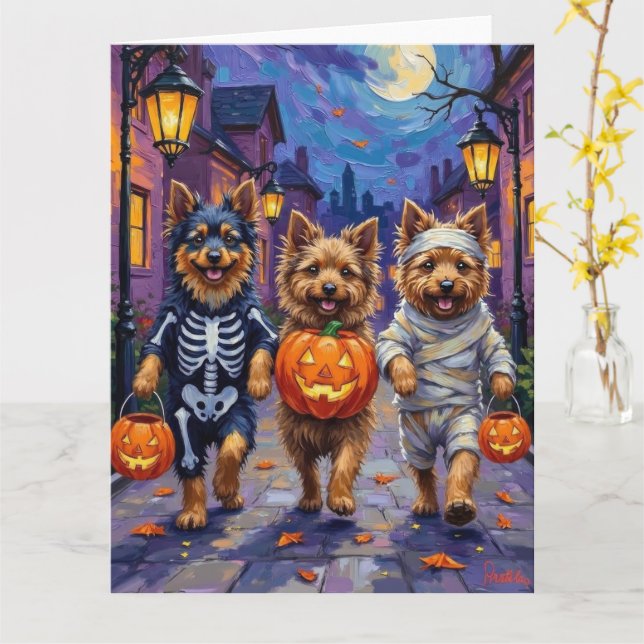 Keeshond Trick-or-Treating in Halloween Costumes Card (Yellow Flower)