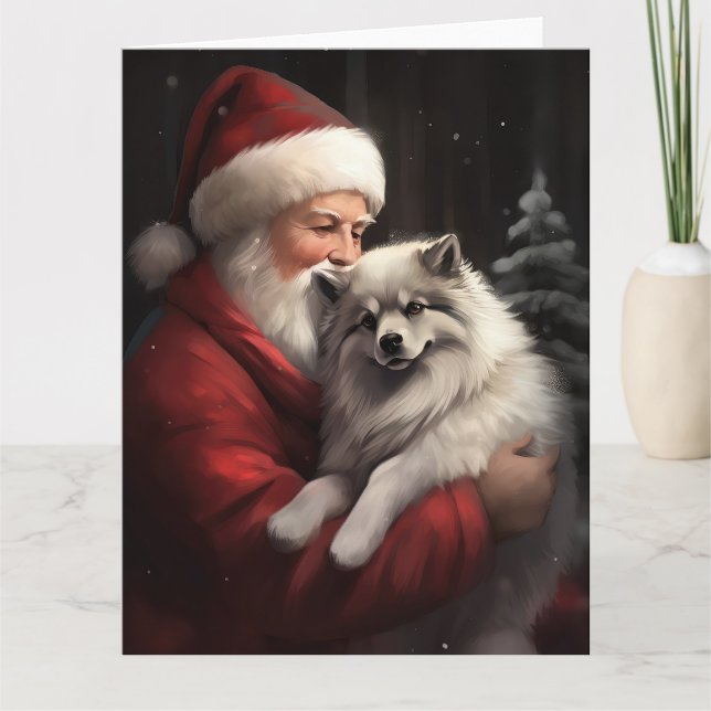 Keeshond With Santa Claus Festive Christmas Card (Front)