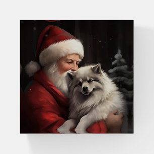 Keeshond With Santa Claus Festive Christmas Paperweight