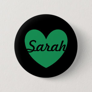 Kelly green polka hearts on black pinback button