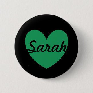Kelly green polka hearts on black pinback button