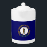 Kentucky: Bluegrass Commonwealth US State Flag Teapot<br><div class="desc">The Kentucky state flag, adopted in 1918, is a simple yet powerful symbol of the state's history and values. It features a field of deep blue, a color often associated with loyalty, wisdom, and perseverance. At the center of the flag is the state seal, which depicts two figures representing the...</div>