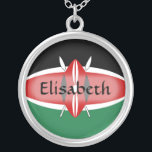 Kenya Flag Name Necklace<br><div class="desc">The design for this attractive pendant features a name overlying the Kenyan flag, which has been neatly morphed to fit the round shape. The featured name can be changed to any name or text of your choice, creating a personalized gift for someone who loves Kenya.
© 2011 FlagAndMap</div>