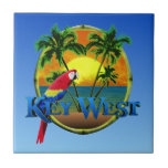 Key West Sunset Ceramic Tile<br><div class="desc">Key West beach sunset painting with palm trees, round bamboo frame, and a colorful parrot.</div>