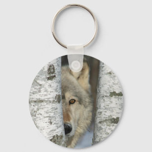 Keychain with photo of gray wolf in birch trees