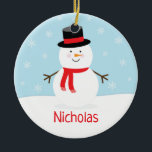 Kids Holiday Snowman Christmas Ornament<br><div class="desc">This holiday ornament features a festive holiday snowman with a red scarf. The background is light blue with falling snowflakes.</div>