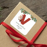 Kids Monogram Christmas Square Sticker<br><div class="desc">Give the gift of personalized charm this Christmas! Our monogram stickers,  featuring Santa hiding behind the letter V,  are a unique and thoughtful way to show your love. Customize with a name,  year and a heartfelt greeting. Make your Christmas gifts stand out!</div>