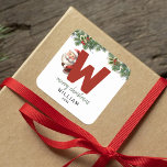 Kids Monogram Christmas Square Sticker<br><div class="desc">Give the gift of personalized charm this Christmas! Our monogram stickers,  featuring Santa hiding behind the letter W,  are a unique and thoughtful way to show your love. Customize with a name,  year and a heartfelt greeting. Make your Christmas gifts stand out!</div>