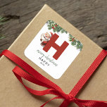 Kids Monogram Christmas Square Sticker<br><div class="desc">Give the gift of personalized charm this Christmas! Our monogram stickers,  featuring Santa hiding behind the letter H,  are a unique and thoughtful way to show your love. Customize with a name,  year and a heartfelt greeting. Make your Christmas gifts stand out!</div>