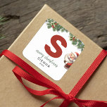 Kids Monogram Christmas Square Sticker<br><div class="desc">Give the gift of personalized charm this Christmas! Our monogram stickers,  featuring Santa hiding behind the letter S,  are a unique and thoughtful way to show your love. Customize with a name,  year and a heartfelt greeting. Make your Christmas gifts stand out!</div>