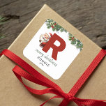 Kids Monogram Christmas Square Sticker<br><div class="desc">Give the gift of personalized charm this Christmas! Our monogram stickers,  featuring Santa hiding behind the letter R,  are a unique and thoughtful way to show your love. Customize with a name,  year and a heartfelt greeting. Make your Christmas gifts stand out!</div>