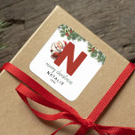 Kids Monogram Christmas Square Sticker<br><div class="desc">Give the gift of personalized charm this Christmas! Our monogram stickers,  featuring Santa hiding behind the letter N,  are a unique and thoughtful way to show your love. Customize with a name,  year and a heartfelt greeting. Make your Christmas gifts stand out!</div>