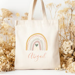 Kids Name Boho Pastel Earth Tones Tote Bag<br><div class="desc">This tote bag features a boho rainbow decorated with a heart and polka dots in muted pastel earth tones of gold,  terracotta,  beige,  dusty rose,  green and ivory. Personalize it with her name in terracotta handwriting script.</div>