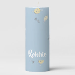 Kids pattern on blue pillar candle