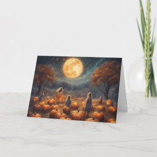 Kids run through the pumpkin patch Halloween Card