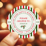 Kids Santa's Workshop North Pole Christmas Gift  Classic Round Sticker<br><div class="desc">These festive santa's workshop christmas gift stickers are perfect for kids holiday gifts. The design features traditional red and green colors with an official north pole seal with the words "special delivery from santa's workshop - north pole" in a fun font. Personalize the stickers with your child's name and the...</div>
