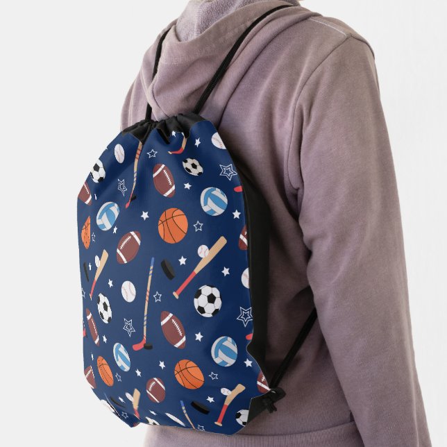 Kids Sports Equipment Pattern on Blue School Drawstring Bag (Insitu)
