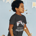 Kids Video Gaming T-Shirt<br><div class="desc">These cool gamer tshirts featuring two gaming control pads over a black background,  with playful text that reads "LEVEL 6 UNLOCKED" and "THEIR NAME AND AGE". All font styles and colors can be changed by clicking on the customize further link after personalizing.</div>