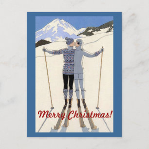 Kissing skiers couple - merry christmas holiday postcard
