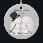 Kissing Snowmen Married Our First Christmas Ceramic Ornament<br><div class="desc">Cute New Ornament featuring Two loving people on their first christmas together. Customize it with your name and wedding date.</div>