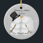 Kissing Snowmen Married Our First Christmas Ceramic Ornament<br><div class="desc">Cute New Ornament featuring Two loving people on their first christmas together. Customize it with your name and wedding date.</div>